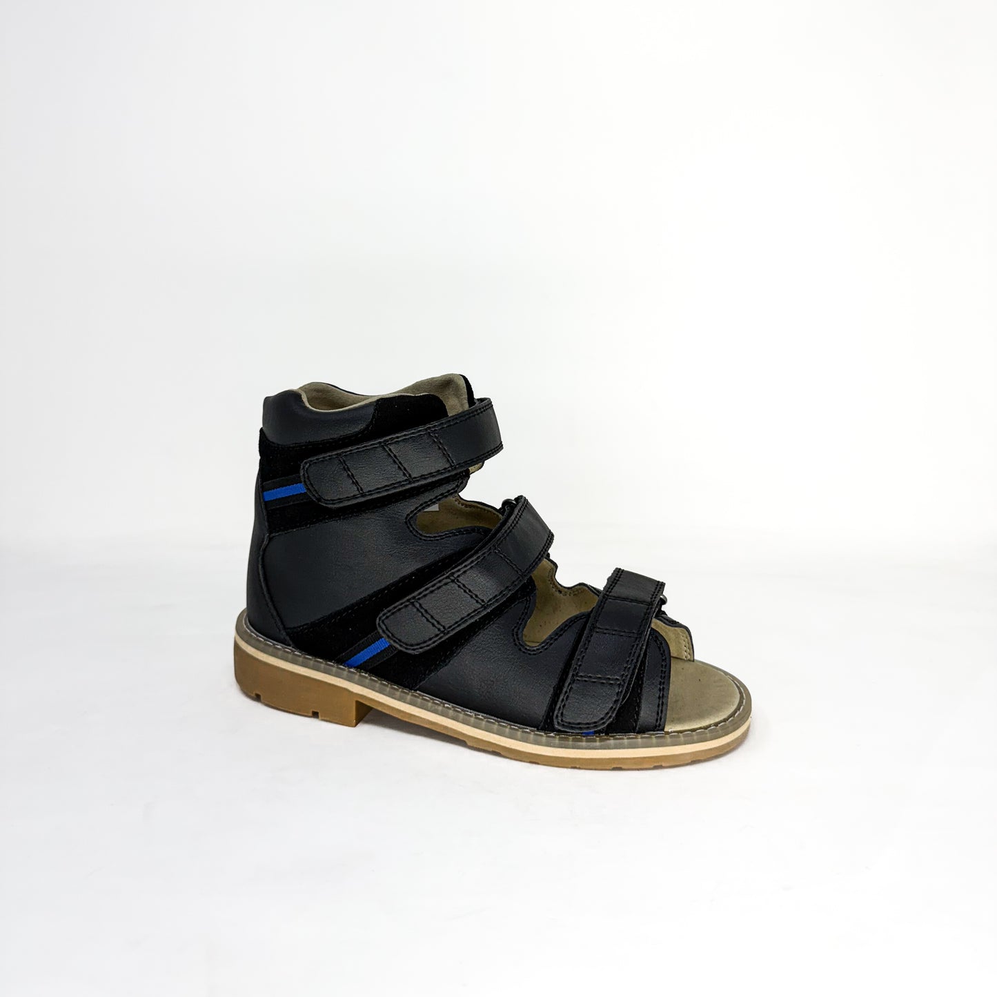 Black orthopedic sandal with multiple straps on a white background